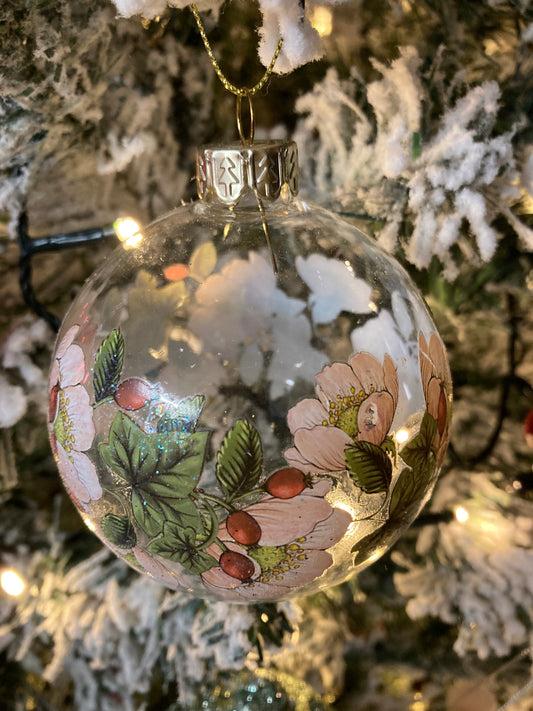 Glass bauble with flower decoration