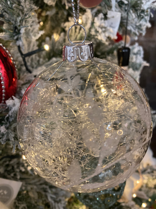 Glass bauble with silver leaves and strands